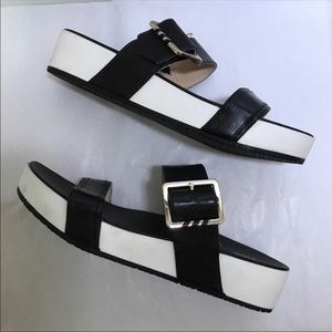 Black and white two strap sandals